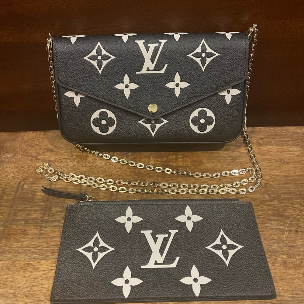 New designer bag-not authentic, genuine leather, great looking bag!